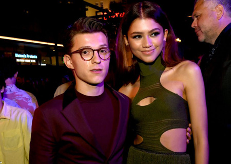 Tom Holland and Zendaya together at a party.